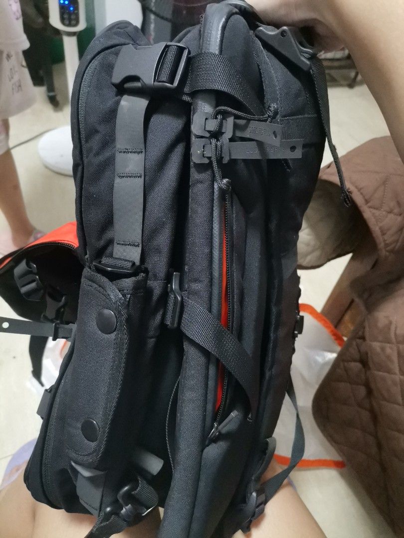 CodeOfBell X-Type Backpack Black Orange (Category: Backpacks) located in Makati City. Submitted by kookybearsstuff (Listing ID 1465827462, Image 3). Description: - Brand: CodeOfBell - Color: Black exterior with vibrant orange interior lining - Laptop Storage: Padded internal compartment with secure velcro strap - Organization: Multiple internal pockets for everyday carry items - Gear Attachment: Lots of external webbing, compression straps, and q
