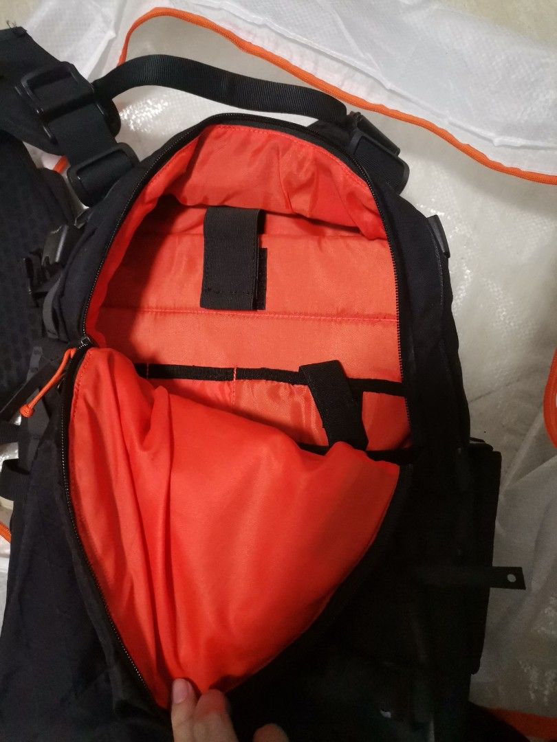 CodeOfBell X-Type Backpack Black Orange (Category: Backpacks) located in Makati City. Submitted by kookybearsstuff (Listing ID 1465827462, Image 2). Description: - Brand: CodeOfBell - Color: Black exterior with vibrant orange interior lining - Laptop Storage: Padded internal compartment with secure velcro strap - Organization: Multiple internal pockets for everyday carry items - Gear Attachment: Lots of external webbing, compression straps, and q