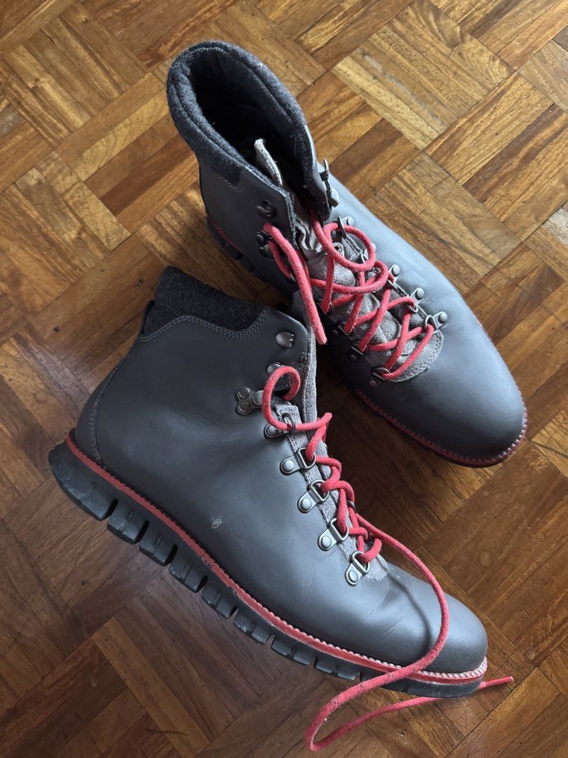 Cole Haan Leather Winter Boots Gray Red Laces (Category: Boots) located in Manila. Submitted by seangoart (Listing ID 1465762859, Image 2). Description: - Brand/Model: Cole Haan Gray Leather Winter Boots - size 44 - Design details: Bright red laces, matching red piping along the sole, and a gray felt collar for extra warmth - Hardware & Sole: Metal hook eyelets for quick lacing and chunky grooved rubber soles for superior grip - Fit: Comfortable 