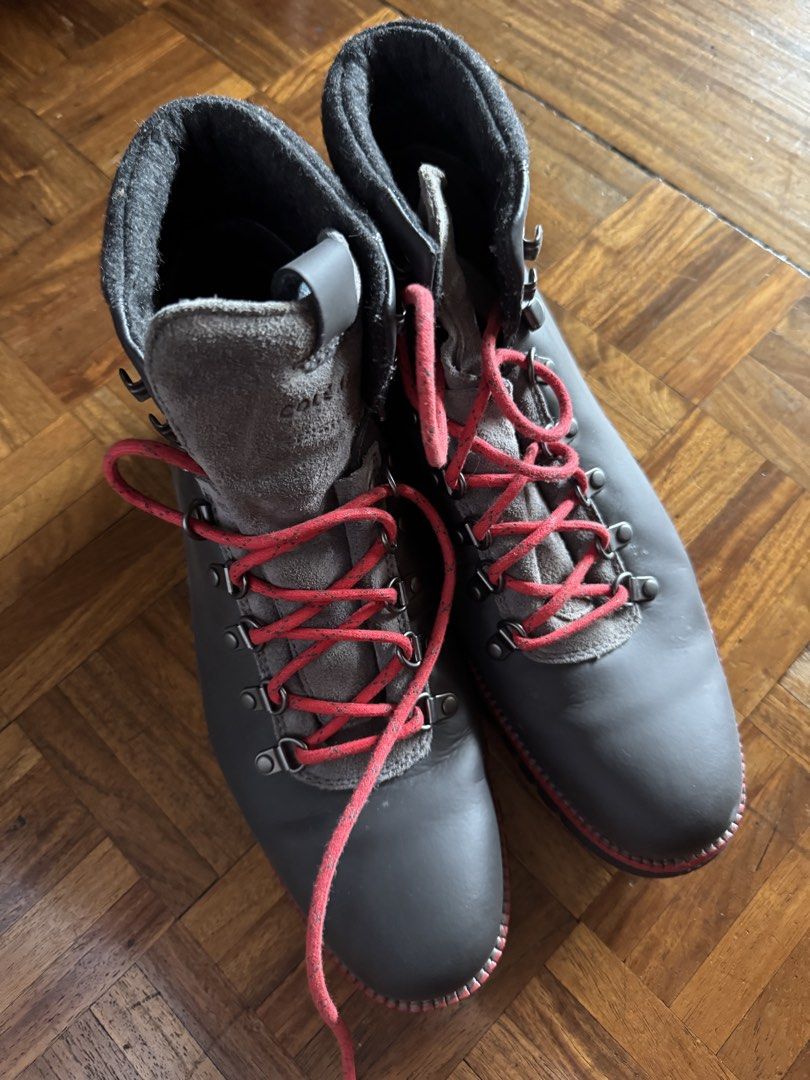 Cole Haan Leather Winter Boots Gray Red Laces (Category: Boots) located in Manila. Submitted by seangoart (Listing ID 1465762859, Image 1). Description: - Brand/Model: Cole Haan Gray Leather Winter Boots - size 44 - Design details: Bright red laces, matching red piping along the sole, and a gray felt collar for extra warmth - Hardware & Sole: Metal hook eyelets for quick lacing and chunky grooved rubber soles for superior grip - Fit: Comfortable 