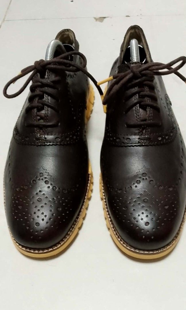 Cole Haan ZEROGRAND Wing Ox (Category: Dress Shoes) located in Caloocan City. Submitted by gareth.vergara (Listing ID 1465930629, Image 1). Description: Cole Haan 2 ZeroGrand STCHLTE Color: Bracken Leather/GL Size: 8.5 w Original Price 10,995 With Box Price 3,600 No issues😉.