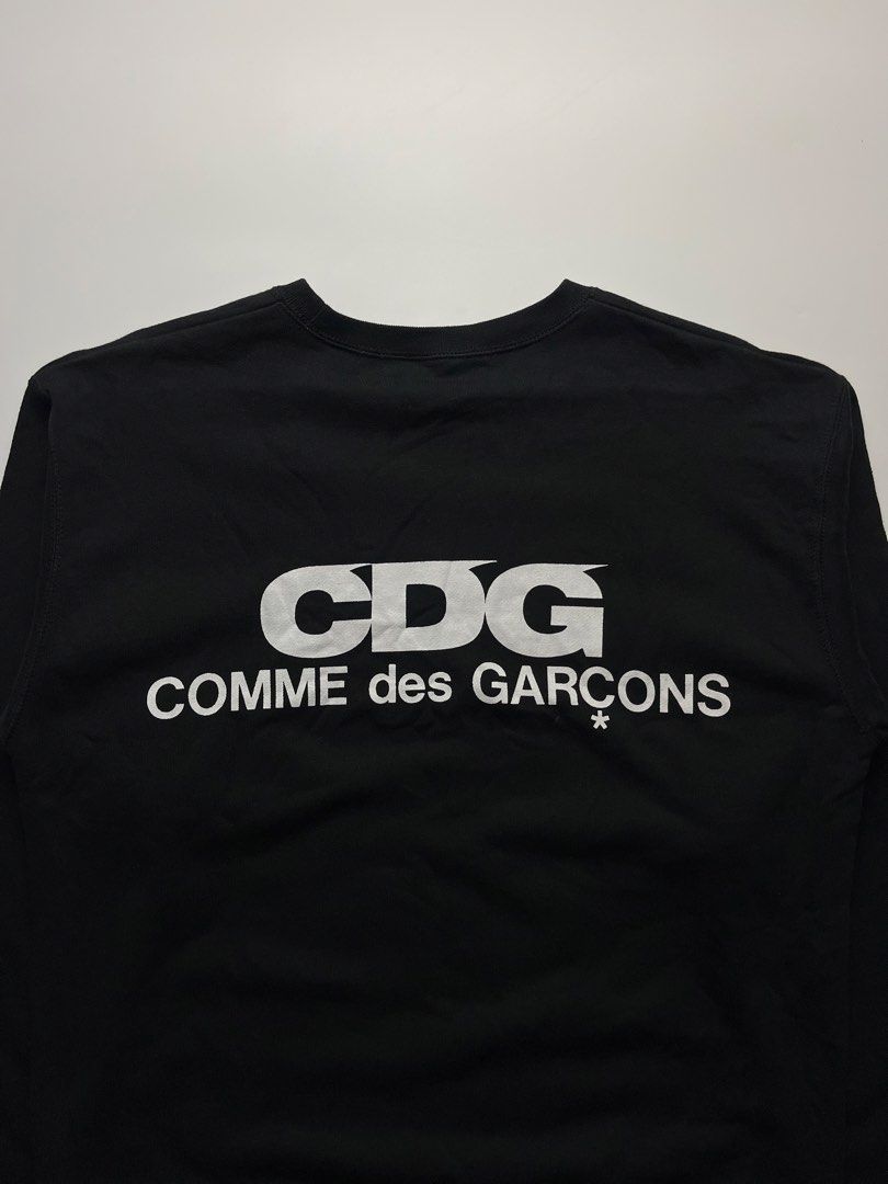 Comme des Garçons CDG Oversized Sweatshirt (Category: Tshirts & Polo Shirts ) located in Manila. Submitted by streetsavvy (Listing ID 1465864102, Image 3). Description: Comme des Garçons CDG Oversized Sweatshirt Size: Large Width: 20.5” Length: 27.5” Shoulder: 19.5” Sleeve Length: 24.5” Hem: 18” Measured in Inches Condition: Excellent condition Flaw: none Made in Vietnam 100% Cotton.