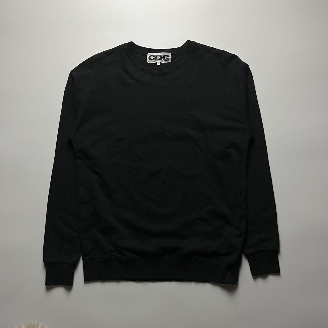 Comme des Garçons CDG Oversized Sweatshirt (Category: Tshirts & Polo Shirts ) located in Manila. Submitted by streetsavvy (Listing ID 1465864102, Image 2). Description: Comme des Garçons CDG Oversized Sweatshirt Size: Large Width: 20.5” Length: 27.5” Shoulder: 19.5” Sleeve Length: 24.5” Hem: 18” Measured in Inches Condition: Excellent condition Flaw: none Made in Vietnam 100% Cotton.