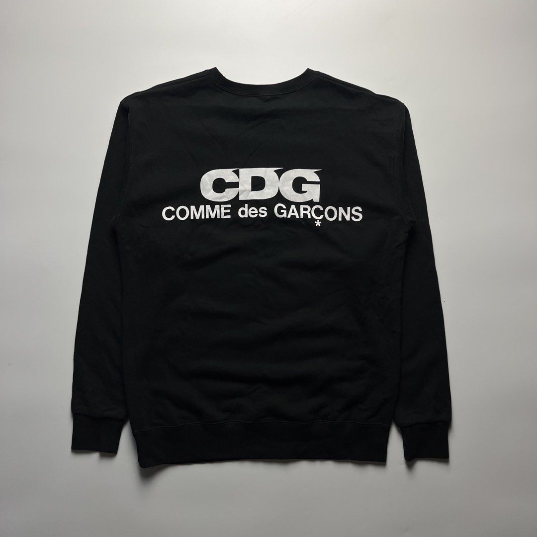 Comme des Garçons CDG Oversized Sweatshirt (Category: Tshirts & Polo Shirts ) located in Manila. Submitted by streetsavvy (Listing ID 1465864102, Image 1). Description: Comme des Garçons CDG Oversized Sweatshirt Size: Large Width: 20.5” Length: 27.5” Shoulder: 19.5” Sleeve Length: 24.5” Hem: 18” Measured in Inches Condition: Excellent condition Flaw: none Made in Vietnam 100% Cotton.