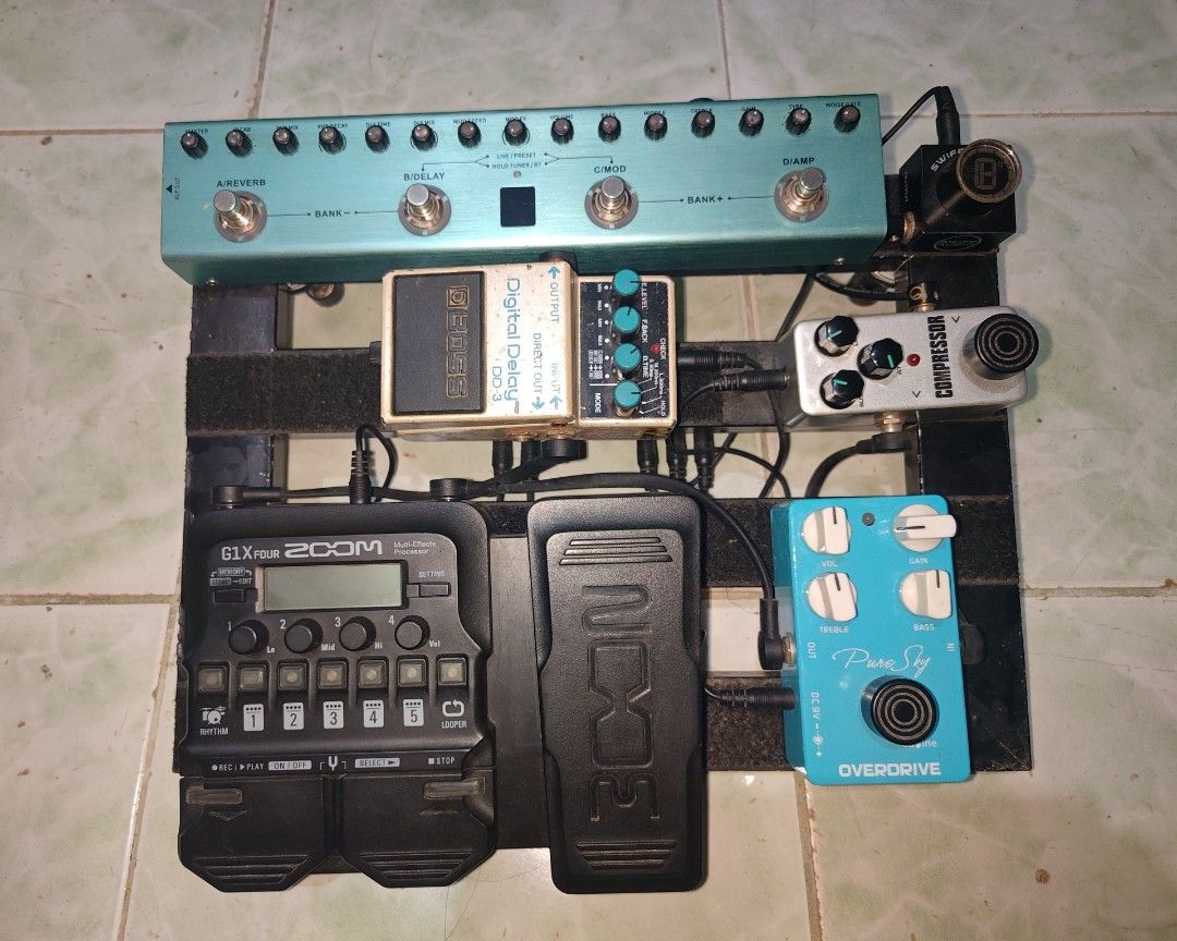 Complete Guitar Pedalboard Setup with Multiple Effects Pedals (Category: Musical Instruments) located in General Trias. Submitted by samclmn (Listing ID 1465869367, Image 1). Description: FS Boss DD3 - 5K Tank G - 2k (No box) Negotiable All of the items ay gumagana naman nang maayos and kasama rin to sa rig ko Issue: Heavily scratched and medyo tanggal paints sa ibang part sa DD3 Minimal scratch sa Tank G Dm nalang po.