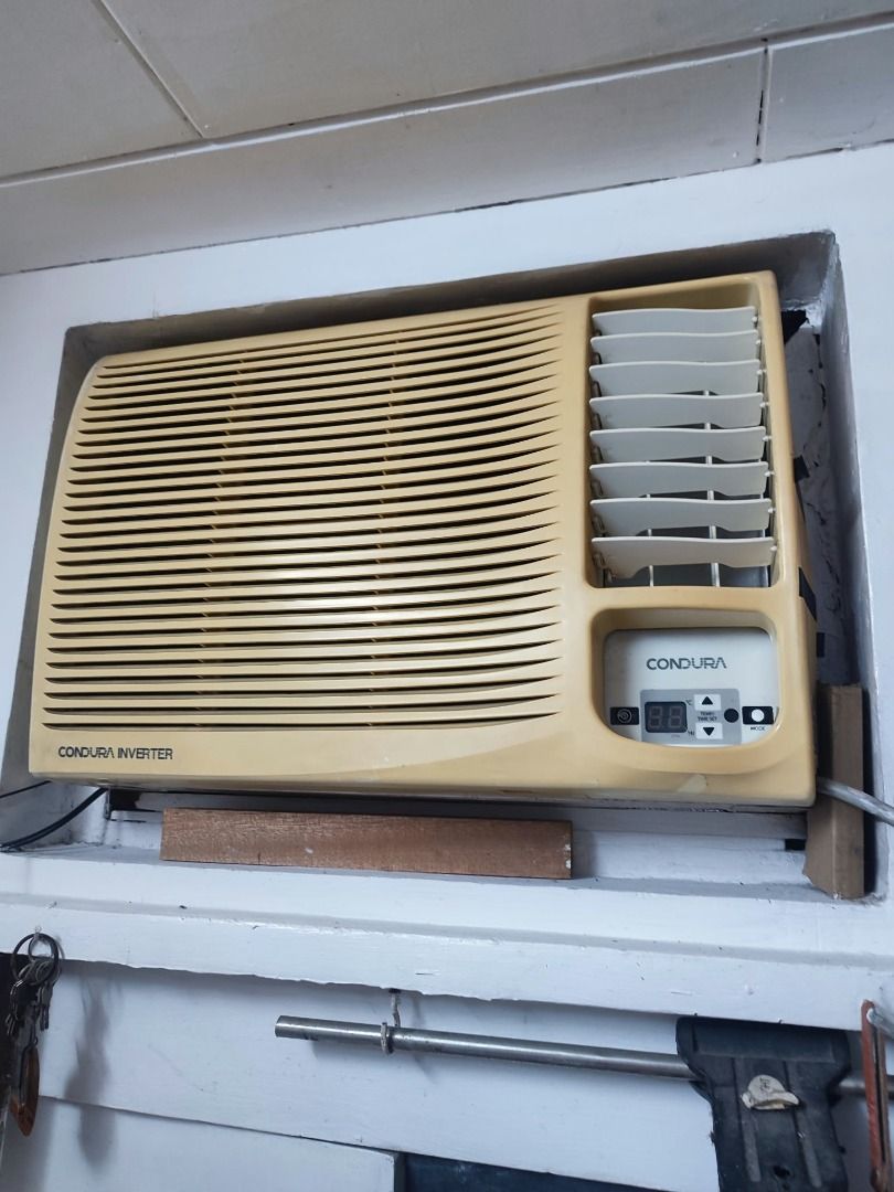 Condura Inverter Window Type Air Conditioner (Category: Air Conditioning and Heating) located in Quezon City. Submitted by camille_cr (Listing ID 1465761456, Image 1). Description: - Brand: Condura window-type air conditioner - Technology: Energy-saving Inverter technology - Display: Built-in digital display panel - Airflow: Adjustable louvers on the right side - Color: Cream / yellowish casing - Installation: Fits standard wall openings - Condit