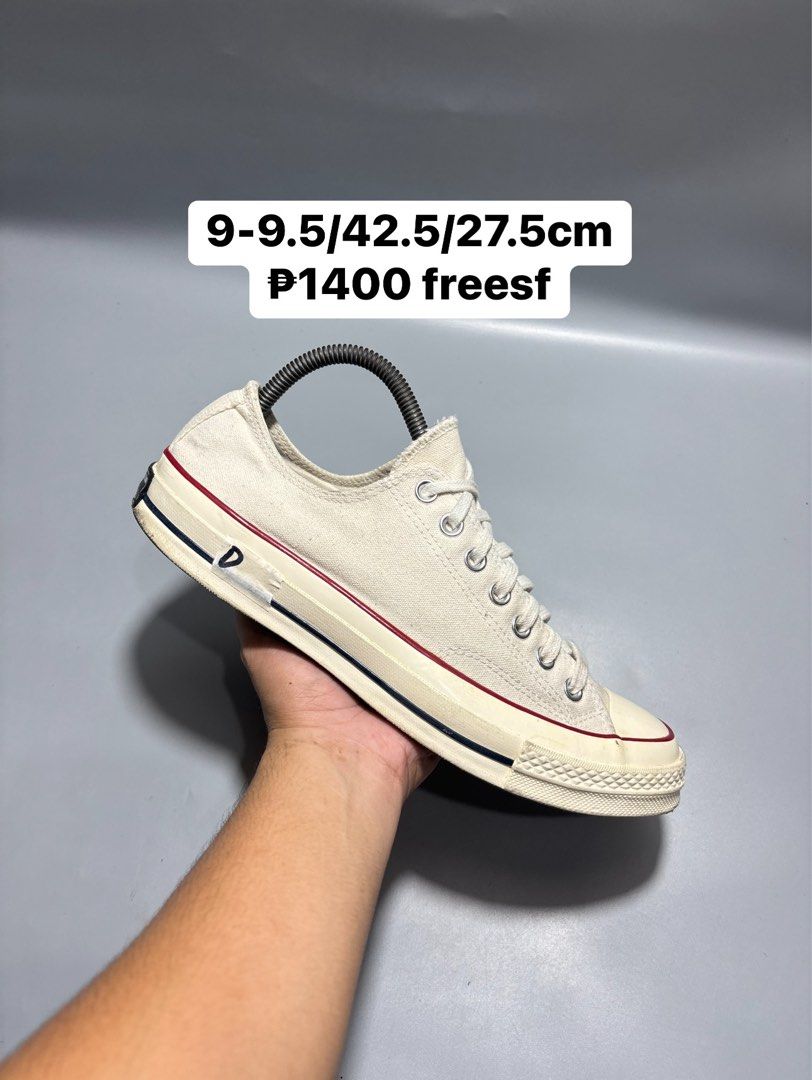 Converse Chuck 70 Low White Parchment Size 9-9.5 (Category: Sneakers) located in Butuan. Submitted by shoeetasho (Listing ID 1465927902, Image 1). Description: - Brand: Converse Chuck 70 Low Top - Color: Parchment White - Size: US 9-9.5 / EUR 42.5 / 27.5cm - Condition: Minimal wear on soles and uppers, clean laces included - Features: Classic rubber toe cap, vulcanized rubber sole with black/red foxing stripes, and black heel license plates.