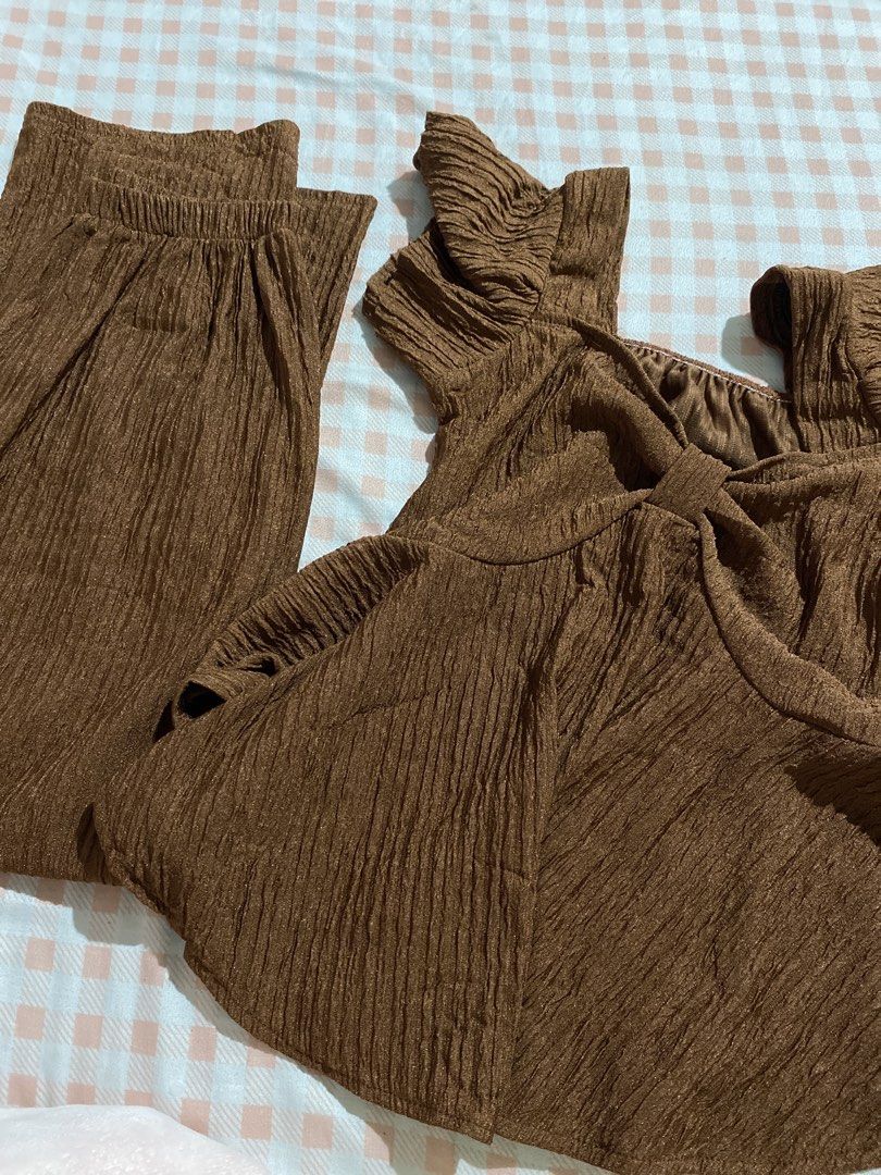 Coords Brown Top Pants Set (Category: Sets or Coordinates) located in Tarlac. Submitted by declutteredbyglai (Listing ID 1465846029, Image 1). Description: - 2-piece brown matching set: short-sleeve top with ruffles and tie-front, plus long pants with an elastic waistband.