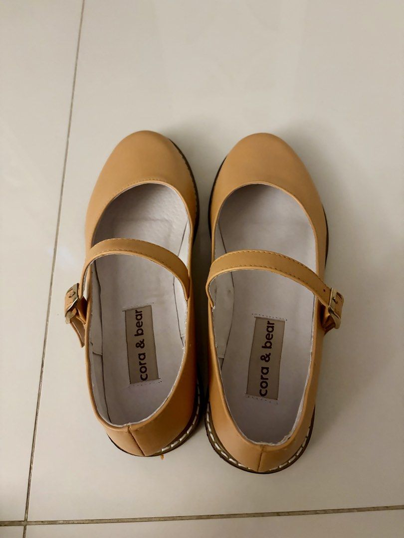 Cora & Bear Yellow Mary Jane Flats Size 7.5 (Category: Flats & Sandals) located in Pasig City. Submitted by sums.chivs (Listing ID 1465911622, Image 1). Description: Cora & Bear Mary Jane flats in tan. Classic rounded toe with an ankle strap and metal buckle. White inner lining with brand tags inside both shoes. Size 7.5 stamped on the bottom soles. Great everyday flats that go with plenty of outfits. Brand new. Only tried it on indoor. RFS: Size