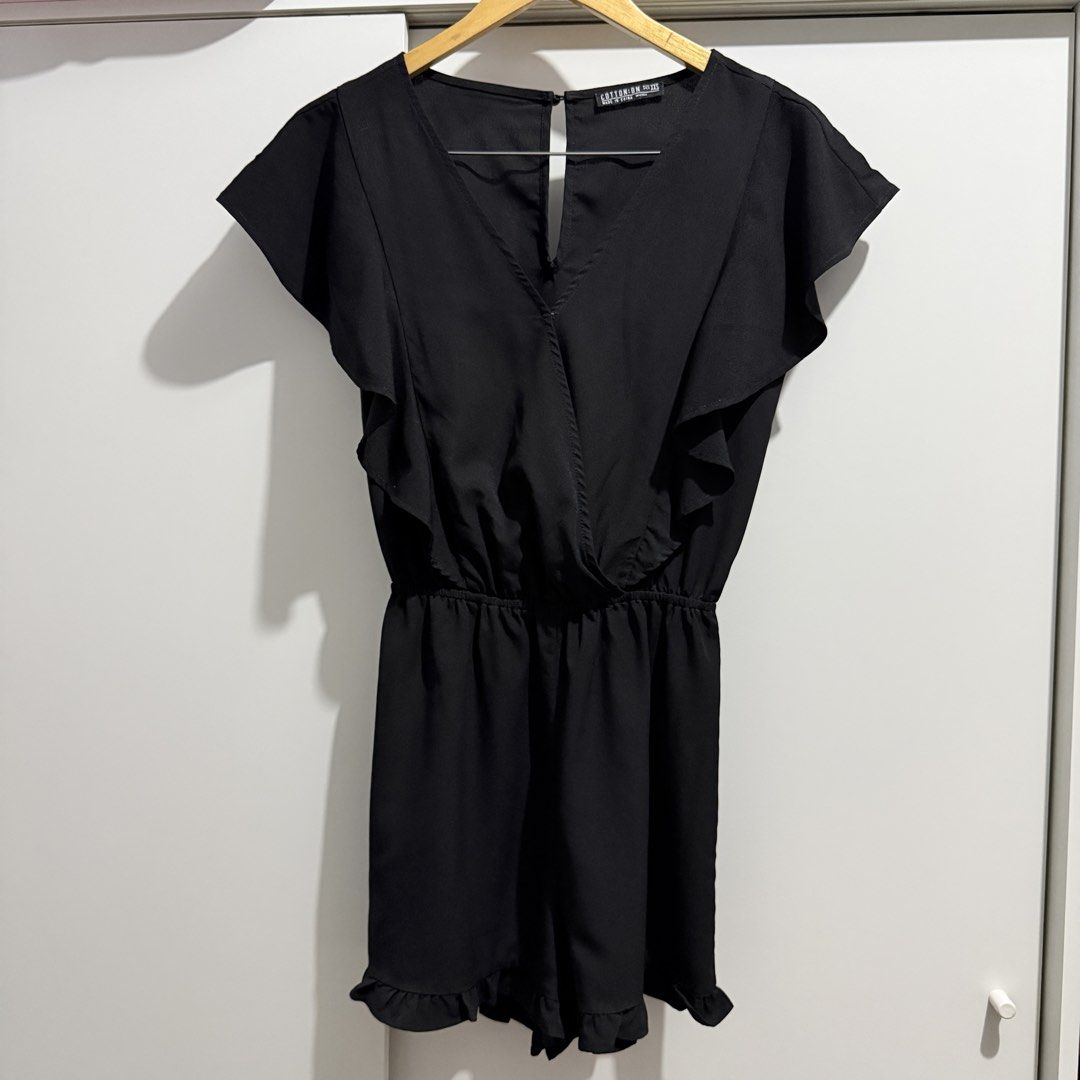 Cotton On Black Ruffle Romper (Category: Rompers) located in Pasay City. Submitted by kaikylestrinkets (Listing ID 1465890028, Image 1). Description: ✿ Cotton On ✿ XXS (fits XXS-S) ✿ Black ✿ In good condition ✿ Ruffled romper (shorts) with garterized waist.