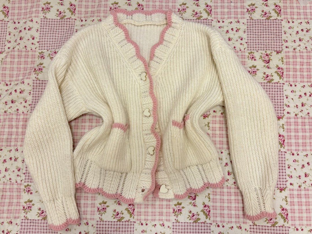 Cream & Pink knit cardigan (Category: Longsleeves) located in Manila. Submitted by andycluttr (Listing ID 1465872187, Image 1). Description: could fit size s-m.