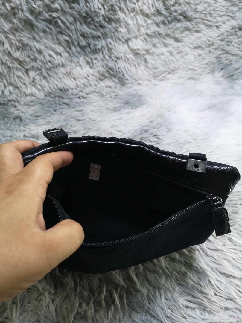Crocodile Embossed Trim Zipper Closure Pouch (Category: Purses & Pouches) located in Santa Cruz. Submitted by jmy_surplus.2 (Listing ID 1465891518, Image 2). Description: Size ; L - 8.4 W - 10 Color ; Black Type ; Pouch Brand ; No brand Material ; Nylon Style ; Black Zipper Closure Pouch LR 129 JMY 5 Batch #224.