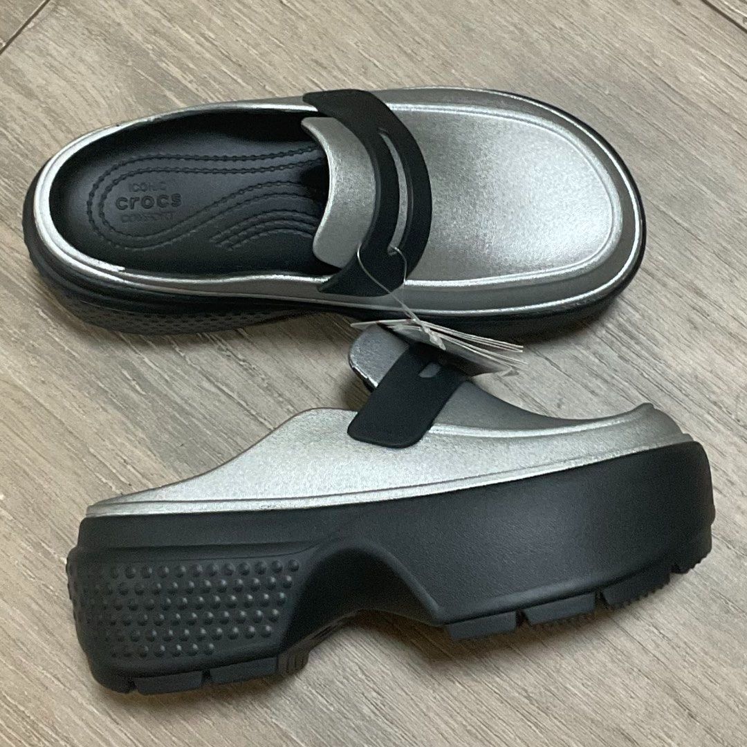 Crocs Stomp Metallic Loafer Silver Black (Category: Loafers) located in Cebu City. Submitted by buddylimong (Listing ID 1465766068, Image 1). Description: - Brand new and authentic crocs bought online from Crocs PH - Color: Silver and Black - Style: Metallic Loafer with contrast top strap - Sole: Chunky platform with durable lug tread - Comfort: Features signature Iconic Comfort footbed - Slip-on design for easy wear - Very cute IRL and seems to 