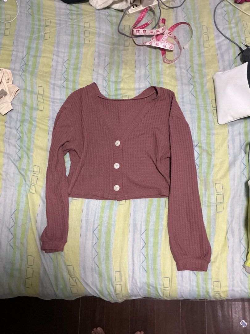 Cropped V-neck Cardigan (Category: Coats, Jackets and Outerwear) located in Manila. Submitted by mornight736 (Listing ID 1463787277, Image 1). Description: - Textured fabric - Fits size S-M - MOP: Gcash + SF - SF shouldered by buyer.