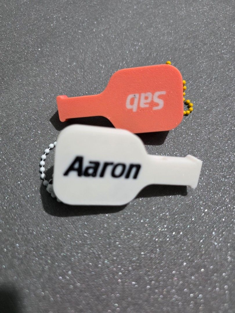 Custom 3D Pickleball Paddle Clicker and Whistle charm (Category: Racket and Ball Sports) located in Quezon City. Submitted by cottoncandyqc (Listing ID 1465919514, Image 3). Description: - Fun 3D-printed miniature pickleball paddle keychain featuring a clicker mini ball - also functions as a whistle - Customizable with names/text (add 20p) (3-7 days for bulk orders) - Multi-color sturdy but lightweight PLA with optional silver keychain - Durable 