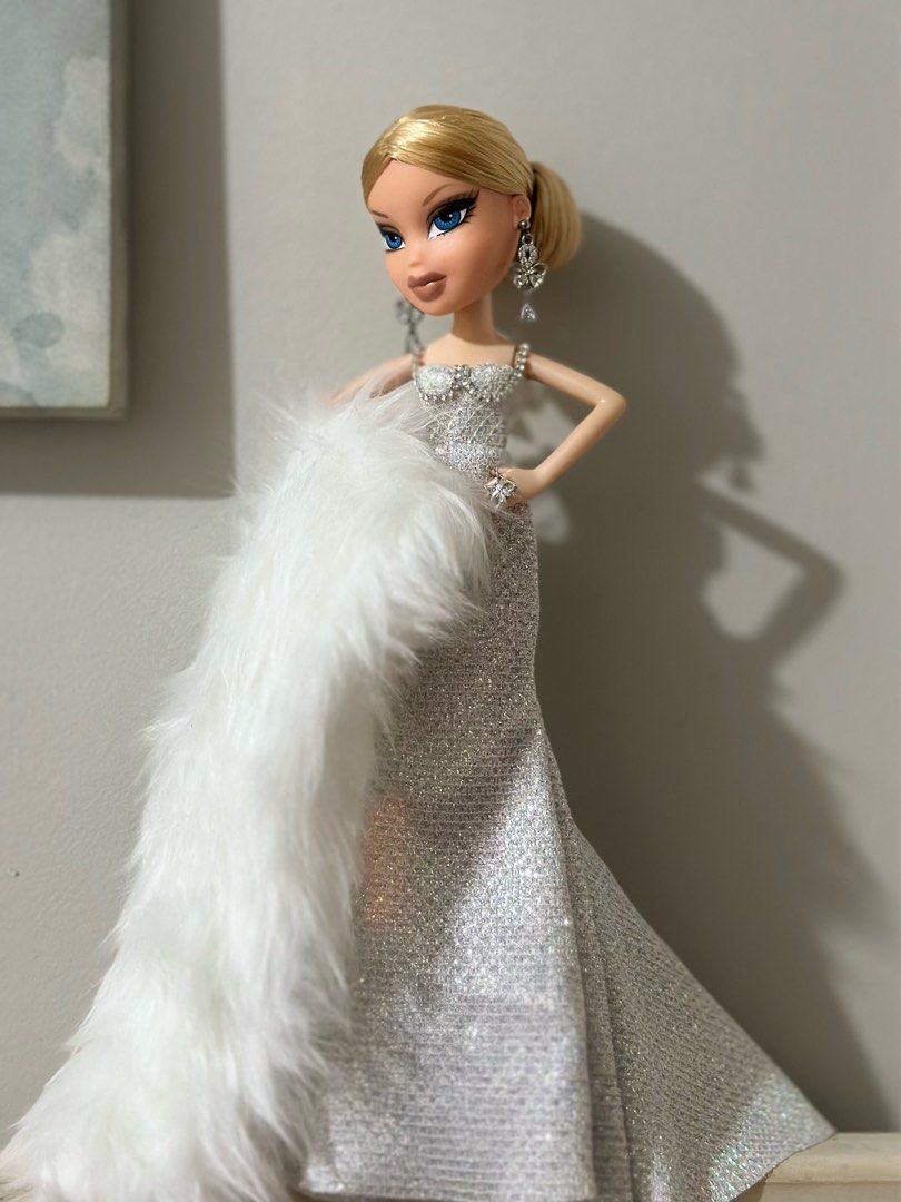 custom gown for bratz (Category: Designer & Blind Box Toys) located in Abucay. Submitted by bratzboy (Listing ID 1465794759, Image 2). Description: glitter mermaid gown with signature crystal chain detail. fur is additional 300 length can be adjusted to fit OG bodies properly. just lemme know closes with metal snaps 1000 plus shipping additional photos upon request.