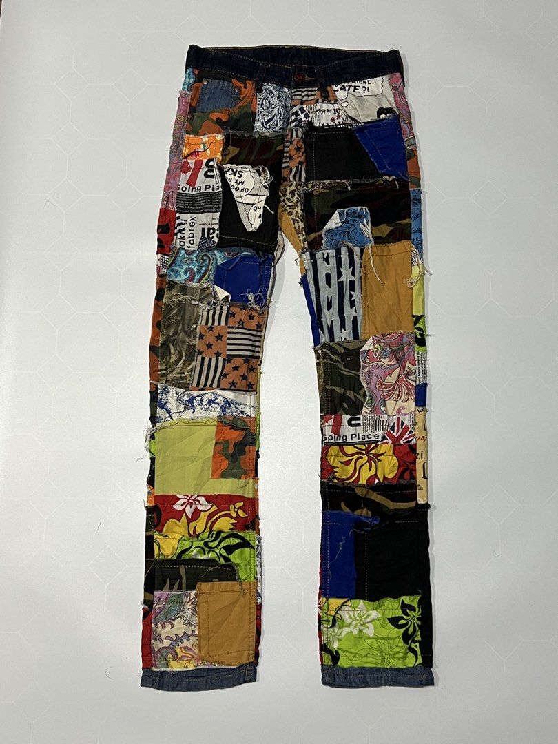 Custom Patchwork Jeans Upcycled Denim Pants (Category: Jeans) located in Caloocan City. Submitted by lostarchive_55 (Listing ID 1465918430, Image 2). Description: - One-of-a-kind upcycled denim jeans - Completely covered in multi-colored fabric patches - Features comic book, leopard print, camo, paisley, and floral patterns - Styled with distressed raw edges and visible seams - Includes custom back pockets and a dark wash waistband.