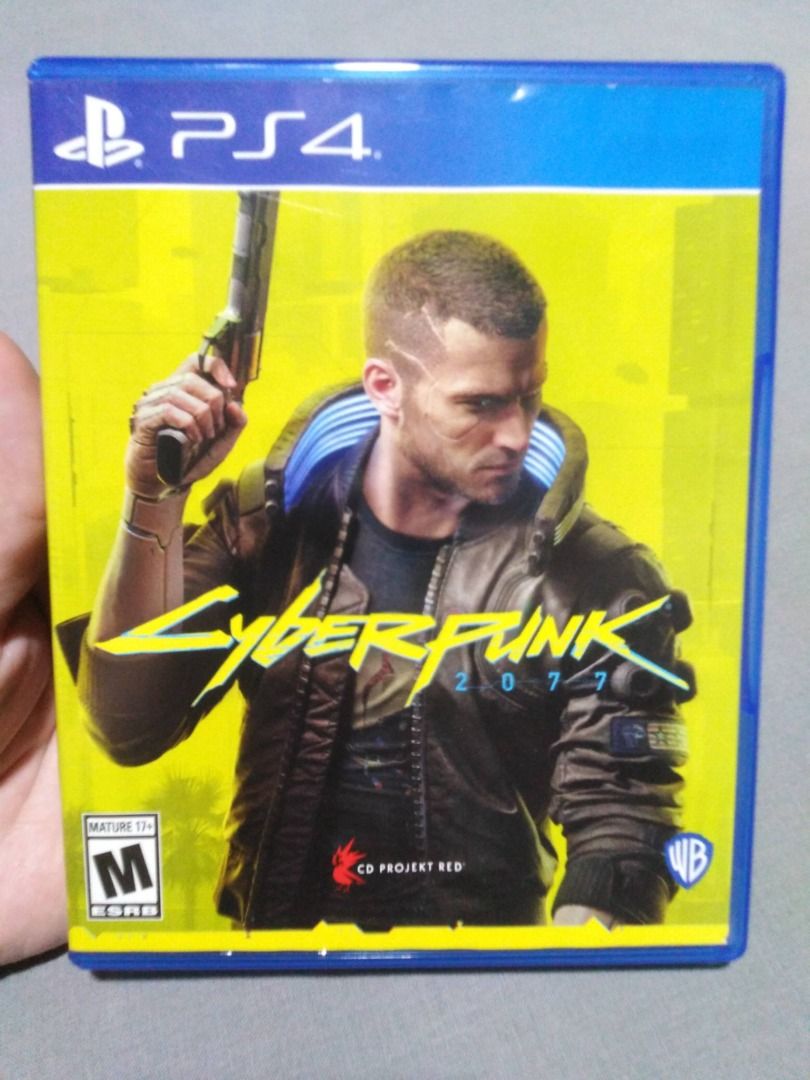 Cyberpunk 2077 PS4 game (Category: PlayStation) located in Quezon City. Submitted by p1.pio (Listing ID 1465857288, Image 1). Description: For sale: Cyberpunk 2077 PS4 game Good condition with normal signs of use Cover art has very small tears, data disc has some scratches on the top side (see photos) Tested and played to completion on PS4 Fixed price, no last price Location: Irosin, Sorsogon Delivery: J&T Express, buyer pays shipping fee Payment