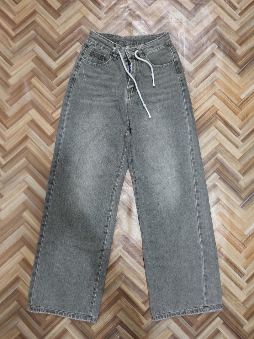 Dark gray baggy pants (Category: Jeans) located in Cabuyao City. Submitted by aena_ (Listing ID 1465888257, Image 1). Description: dark washed gray - still available — size 23-24 | length 39 — hard denim, no flaws — 249 mod. direct jnt only loc. Laguna.