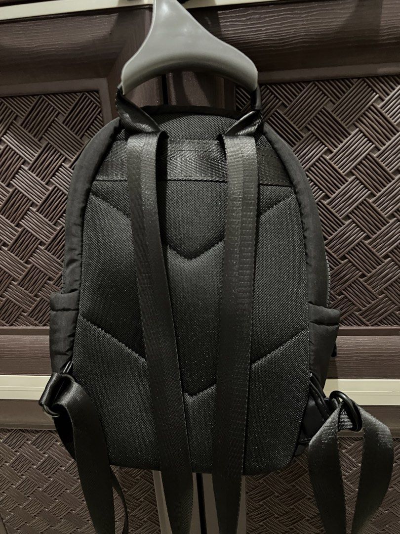 David Jones Paris Black Puffer Backpack with Keychain (Category: Backpacks) located in Cavite. Submitted by 24g.ph (Listing ID 1465870824, Image 2). Description: - Brand: David Jones Paris - Color/Style: Chic black quilted design - Closure & Straps: Secure chunky top zip with adjustable padded straps - Comfort: Breathable mesh backing for all-day wear - Storage: Roomy interior featuring a zipper pocket and side pockets - Extras: Includes an adora