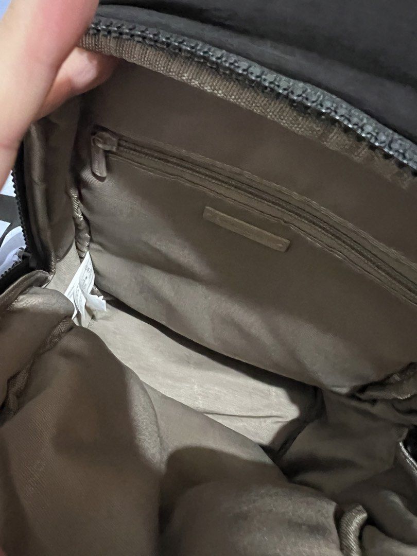 David Jones Paris Black Puffer Backpack with Keychain (Category: Backpacks) located in Cavite. Submitted by 24g.ph (Listing ID 1465870824, Image 3). Description: - Brand: David Jones Paris - Color/Style: Chic black quilted design - Closure & Straps: Secure chunky top zip with adjustable padded straps - Comfort: Breathable mesh backing for all-day wear - Storage: Roomy interior featuring a zipper pocket and side pockets - Extras: Includes an adora