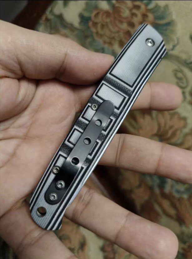 DeerFar CR76 Multi Purpose Tool Fruit and Shrimp Peeler Skinner (Category: Knives & Chopping Boards) located in Quezon City. Submitted by liana.finds (Listing ID 1465796782, Image 1). Description: - Slim folding pocket knife with a comfortable grip - Textured black and white handle scales for a secure hold - Durable stainless steel pocket clip secured with TORX screws - Built-in lanyard hole at the tail end - Clean hardware with a sleek overall p