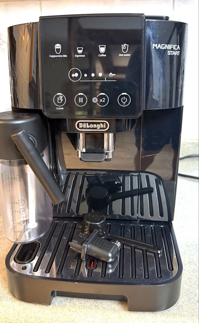 Delonghi Magnifica Start Espresso Cappuccino Coffee Machine (Category: Coffee Machines & Makers) located in Paranaque City. Submitted by jaysanti (Listing ID 1465848745, Image 1). Description: Delonghi Magnifica Start model no. Ecam220.63B super automatic bean to cup coffee machine you can also use ground coffee, can make cappuccino mix, espresso, lungo 0-9-1-5-2-8-7-2-7-5-6 slight damage on the ground coffee cover but it does no affect the coffe