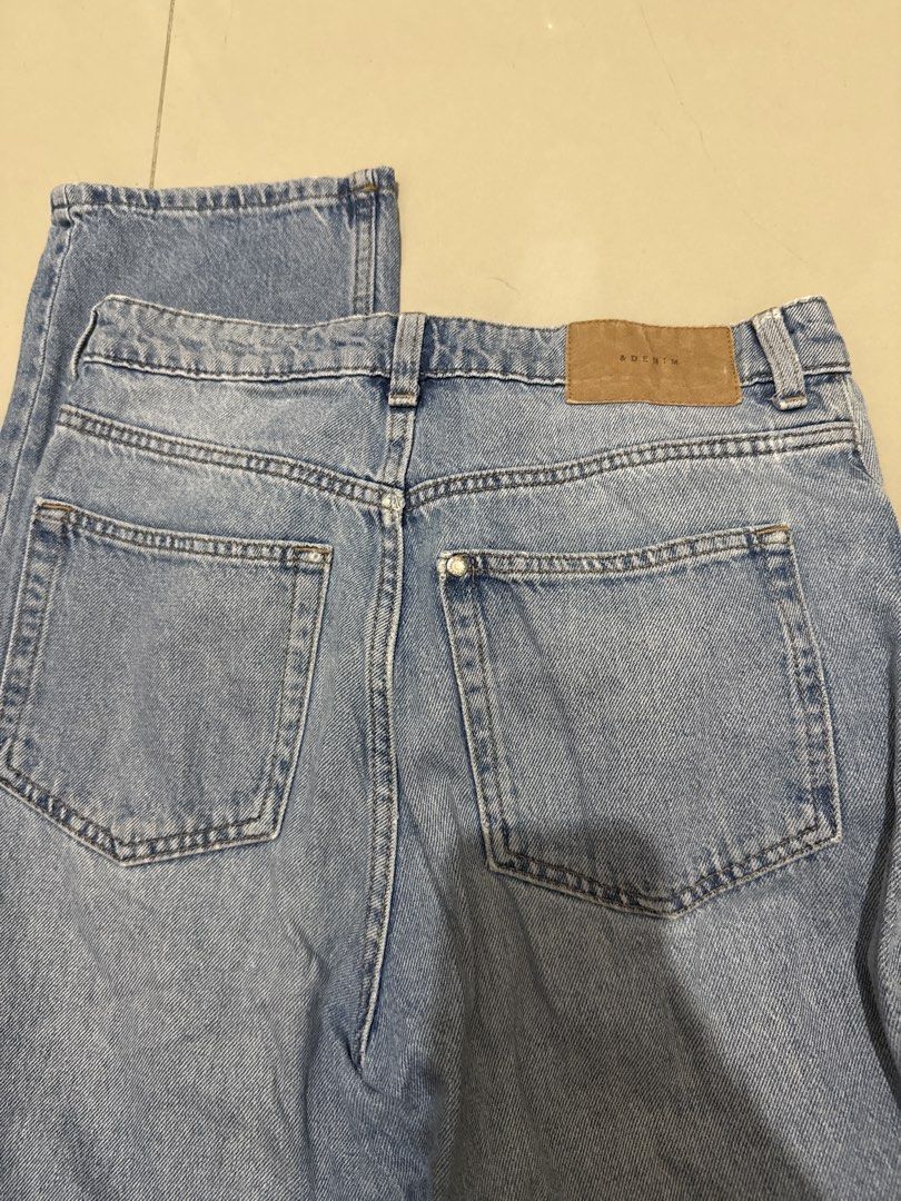 &DENIM Light Wash Straight Leg Jeans (Category: Jeans) located in Manila. Submitted by hiiipurple (Listing ID 1465863453, Image 3). Description: - Brand: &DENIM - Wash: Light wash, classic blue denim - Fit: Straight leg cut - Closure: Zip fly with metal button - Details: Small button on the right back pocket, tan leather brand patch at the back waistband - Style: Versatile everyday staple, perfect for pairing with basic tees and hoodies.