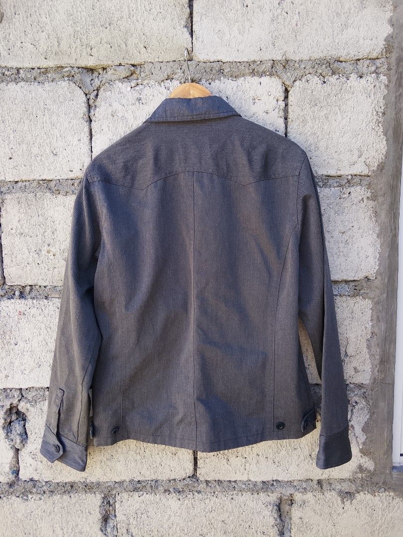 Dickies button-front work jacket (Category: Coats, Jackets and Outerwear) located in Bayombong. Submitted by jeffreybee (Listing ID 1465793967, Image 2). Description: BRAND NEW CONDI 26 Length 21.5 width Dickies button-front work jacket featuring a classic collar, angled chest pocket with a zipper, and side hand pockets..