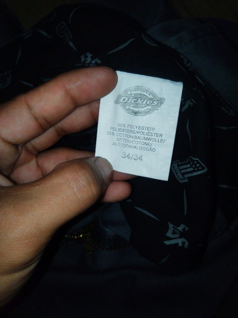 Dickies x Spitfire Collaboration Pants Size 34 (Category: Chinos) located in Manila. Submitted by jaradhiggins24 (Listing ID 1465866475, Image 3). Description: - Brand: Dickies x Spitfire - Color: Dark charcoal grey - Size: 34 x 34 - Fit: Standard workwear fit - Material: Sturdy poly-cotton blend for heavy-duty daily wear or skating - Details: Dual-branded patch on back pocket and custom printed inner waistband lining - Condition: Clean overall.