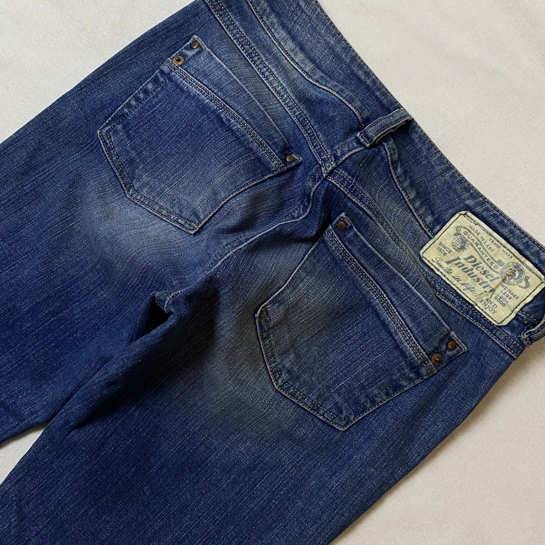 Diesel Industry Denim Jeans Bootcut Flare Blue (Category: Jeans) located in Davao. Submitted by y2c0re (Listing ID 1465780384, Image 3). Description: Diesel Bootcut jeans Authentic Tagged 26 - 26 can fit 28 waist - 10 thighs - 41.5 length - 9 hem No flaws Normal sign of usage 9.5/10 - Diesel Industry - Bootcut flare leg, low to mid rise waist - Wash: Medium blue with natural fading and whiskering - Size: Tagged 26 x 32 - Details: Classic 5-pocket