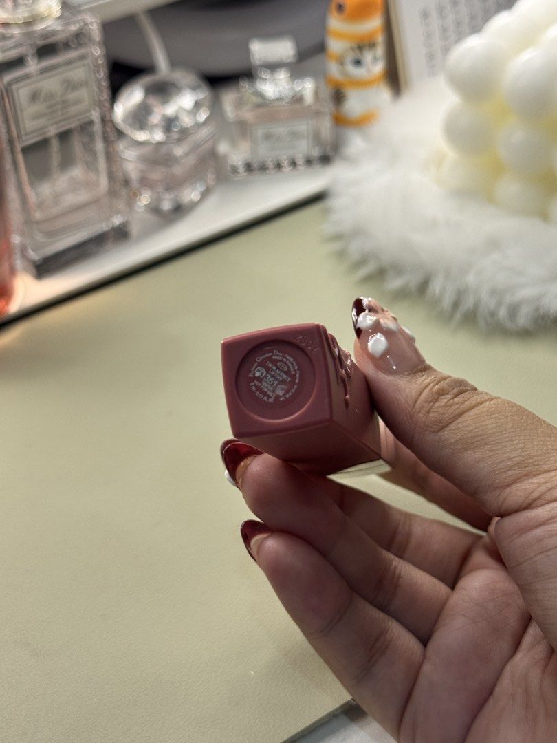 Dior Addict Lip Tint 351 (Category: Makeup) located in Binan City. Submitted by seoulbeauty_cart (Listing ID 1465771490, Image 2). Description: - Authentic Dior Addict Lip Tint - Shade: 351 Natural Nude - (Tester unit, marked 'not for sale' on base) - Formula: Long-wear and transfer-proof finish - Packaging: Matte burgundy tube with silver cap and embossed Dior logo.