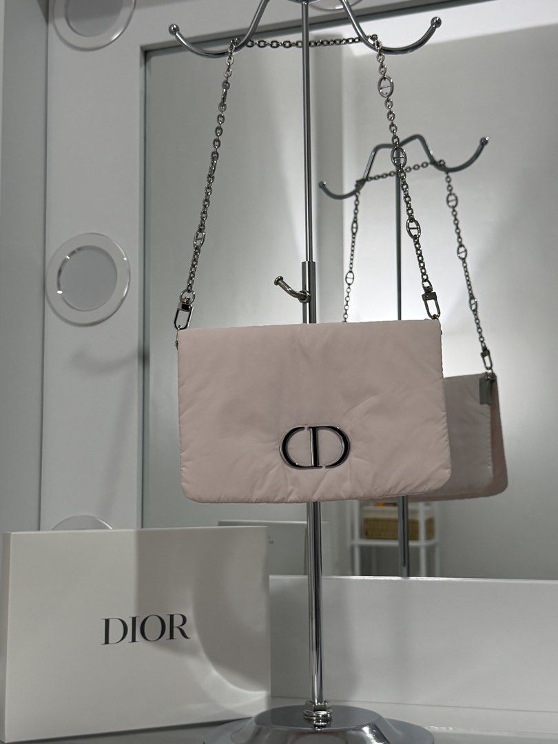 Dior pink pouch with Chain Strap (Category: Luxury Bags & Wallets) located in Manila. Submitted by ms.cee_ (Listing ID 1465887128, Image 1). Description: - Authentic GWP Dior Pouch - Removable matching silver chain strap with clips - Includes original Dior white box - Condition: Excellent/Pristine - PM for more details or fast transactions!.