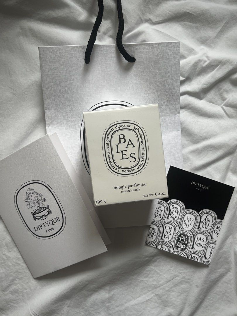 Diptyque Baies Scented Candle 190g (Category: Home Fragrance) located in Cebu City. Submitted by msgm55 (Listing ID 1465809193, Image 1). Description: Brand new Diptyque Baies (Berries) classic candle, 190g. Never lit, still sealed. Scent: blackcurrant leaves and Bulgarian rose, fruity, fresh, and floral Burn time: up to ~60 hours Includes: Diptyque paper bag and care card Perfect as a gift or for your own home. Great for living rooms, bedrooms, 