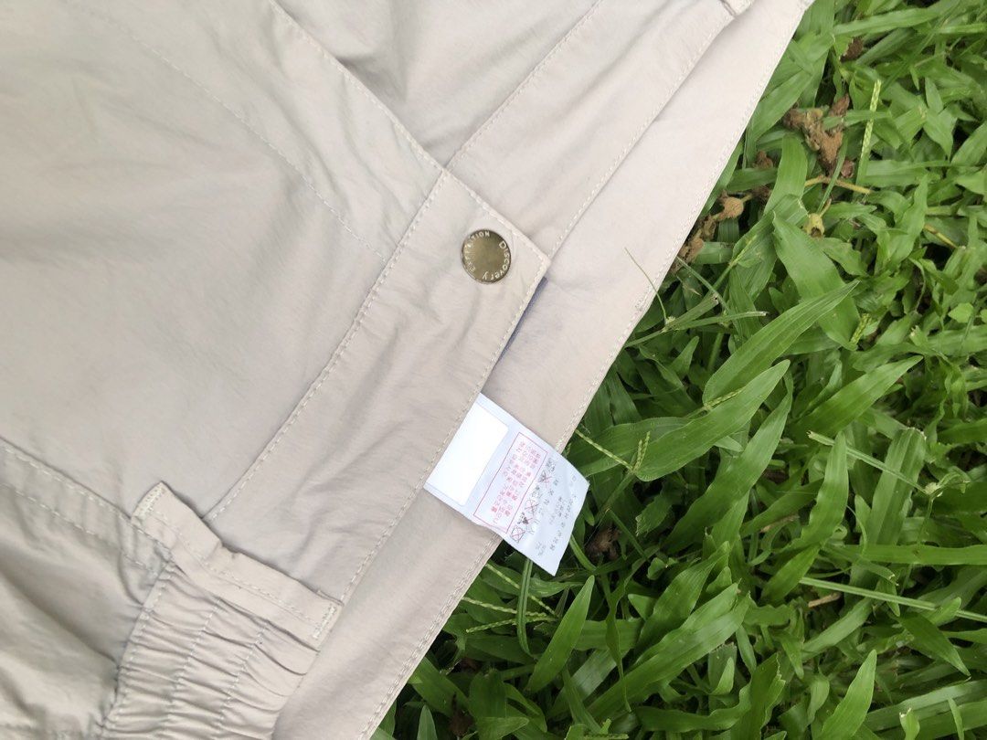 Discovery Expedition Cargo Jogger Pants Beige Size 32 (Category: Joggers) located in Kabasalan. Submitted by hamugaway (Listing ID 1465826704, Image 3). Description: - Brand: Discovery Expedition - Style: Cargo Joggers - Color: Beige - Size: 32 (82) - Condition: Clean, brand new with tags attached inside - Material: Lightweight technical fabric - Features: Elastic waistband with button closure, multiple side utility pockets, and elastic ankle cuf