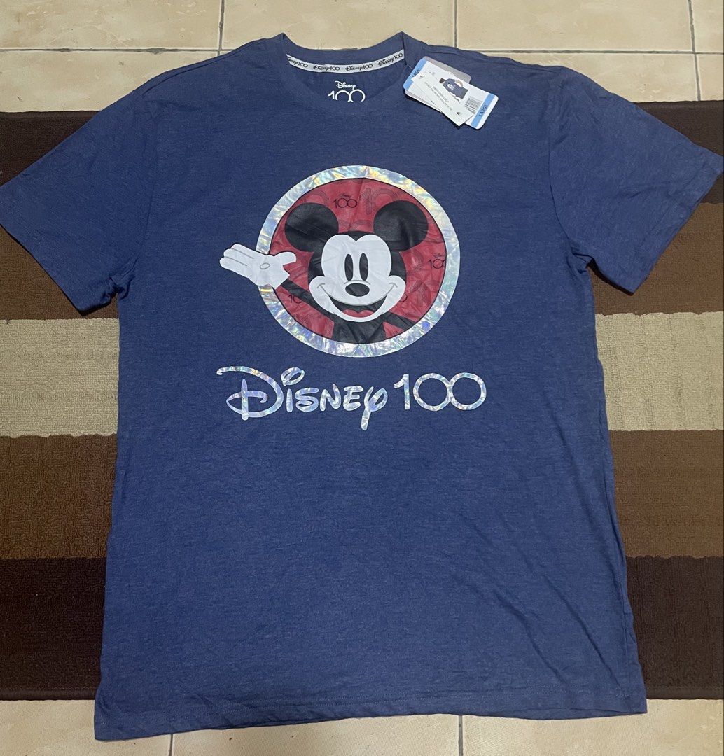 DISNEY MICKEY MOUSE LARGE TSHIRT (Category: Tshirts & Polo Shirts ) located in Batangas. Submitted by streetheadph (Listing ID 1465905117, Image 1). Description: DISNEY MICKY MOUSE TSHIRT SIZE ON TAG : LARGE DIMES: W 22 / L 31 CONDITION: BNEW COLOR: BLUE COLORRATE: 9.3 / 10 ISSUE: NEED WASH PRICE: 800SHIPPING FEE NEED WASH THIS ITEM IS UKAY PLEASE MANAGE YOUR EXPECTATION ALWAYS READ THE DETAILS.
