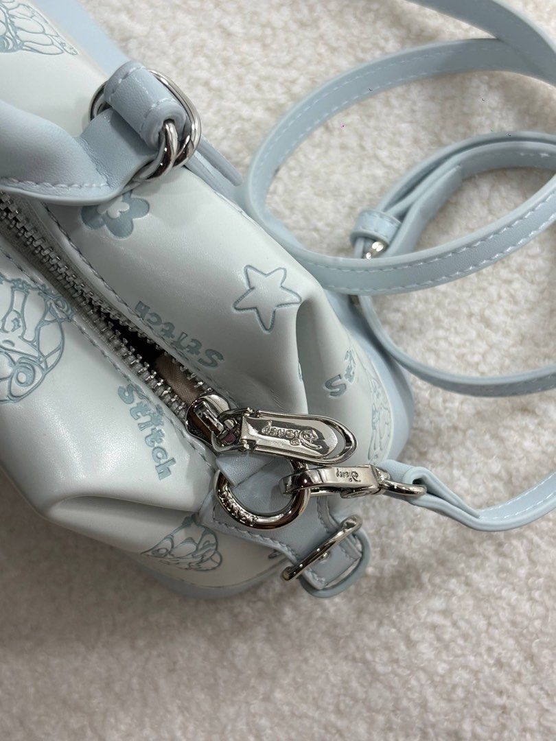 Disney Stitch Crossbody Bag (Category: Cross-body Bags) located in Manila. Submitted by aiman_sole5 (Listing ID 1465891573, Image 3). Description: the cutest little bag for the girlies 🩵🧸🎀 and yes, the little bear comes with it 🥹 1️⃣1️⃣8️⃣0️⃣ 📍 Imus, Cavite - Lalamove available (same day delivery) - JNT shipping available.