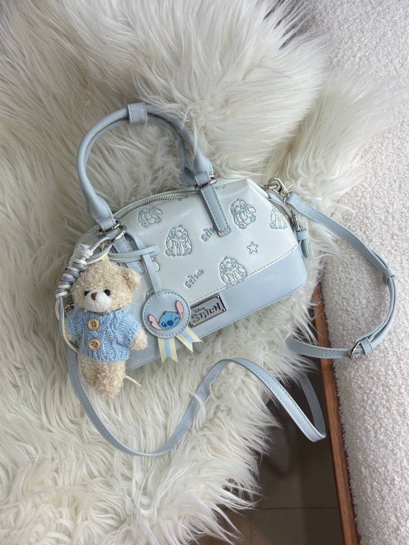 Disney Stitch Crossbody Bag (Category: Cross-body Bags) located in Manila. Submitted by aiman_sole5 (Listing ID 1465891573, Image 1). Description: the cutest little bag for the girlies 🩵🧸🎀 and yes, the little bear comes with it 🥹 1️⃣1️⃣8️⃣0️⃣ 📍 Imus, Cavite - Lalamove available (same day delivery) - JNT shipping available.