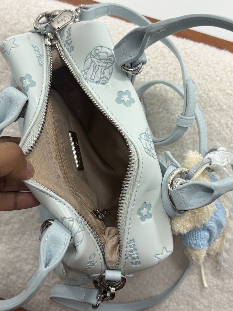 Disney Stitch Crossbody Bag (Category: Cross-body Bags) located in Manila. Submitted by aiman_sole5 (Listing ID 1465891573, Image 2). Description: the cutest little bag for the girlies 🩵🧸🎀 and yes, the little bear comes with it 🥹 1️⃣1️⃣8️⃣0️⃣ 📍 Imus, Cavite - Lalamove available (same day delivery) - JNT shipping available.