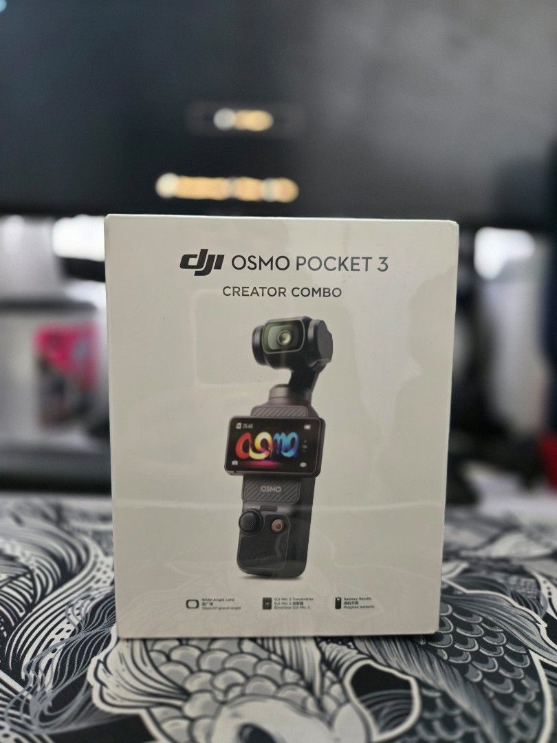 DJI Osmo Pocket 3 Creator Combo (Category: Video Cameras) located in Manila. Submitted by emenel (Listing ID 1465763656, Image 1). Description: - Condition: Brand new, unopened, and still sealed in original retail box - Model: DJI Osmo Pocket 3 Creator Combo - Camera: 1-inch CMOS sensor with stunning 4K120fps video recording - Display: Convenient 2-inch rotatable touchscreen - Complete Creator Combo Kit: Includes battery handle, DJI Mic 2 transmi