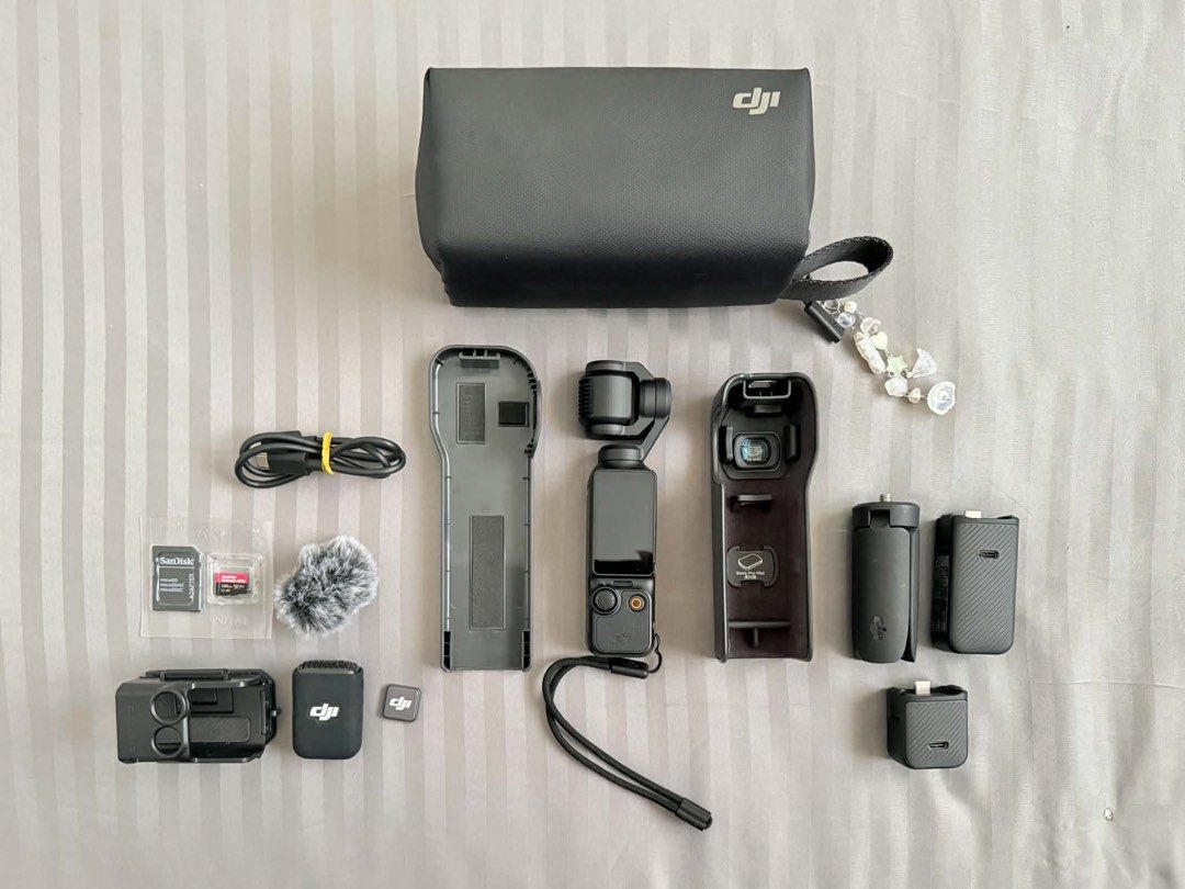 DJI Osmo Pocket 3 Creator Combo (Category: Cameras) located in Bacoor. Submitted by sxfhia (Listing ID 1465868731, Image 1). Description: Title: DJI Osmo Pocket 3 Creator Combo (Rarely Used) + Brand New 128GB SanDisk SD Card Selling my rarely used DJI Osmo Pocket 3 Creator Combo. Bought on June 8, 2025, but it mostly stayed inside the bag. Good as new! It also comes with a FREE brand-new, sealed SanDisk Extreme PRO 128GB microSD card so you can s