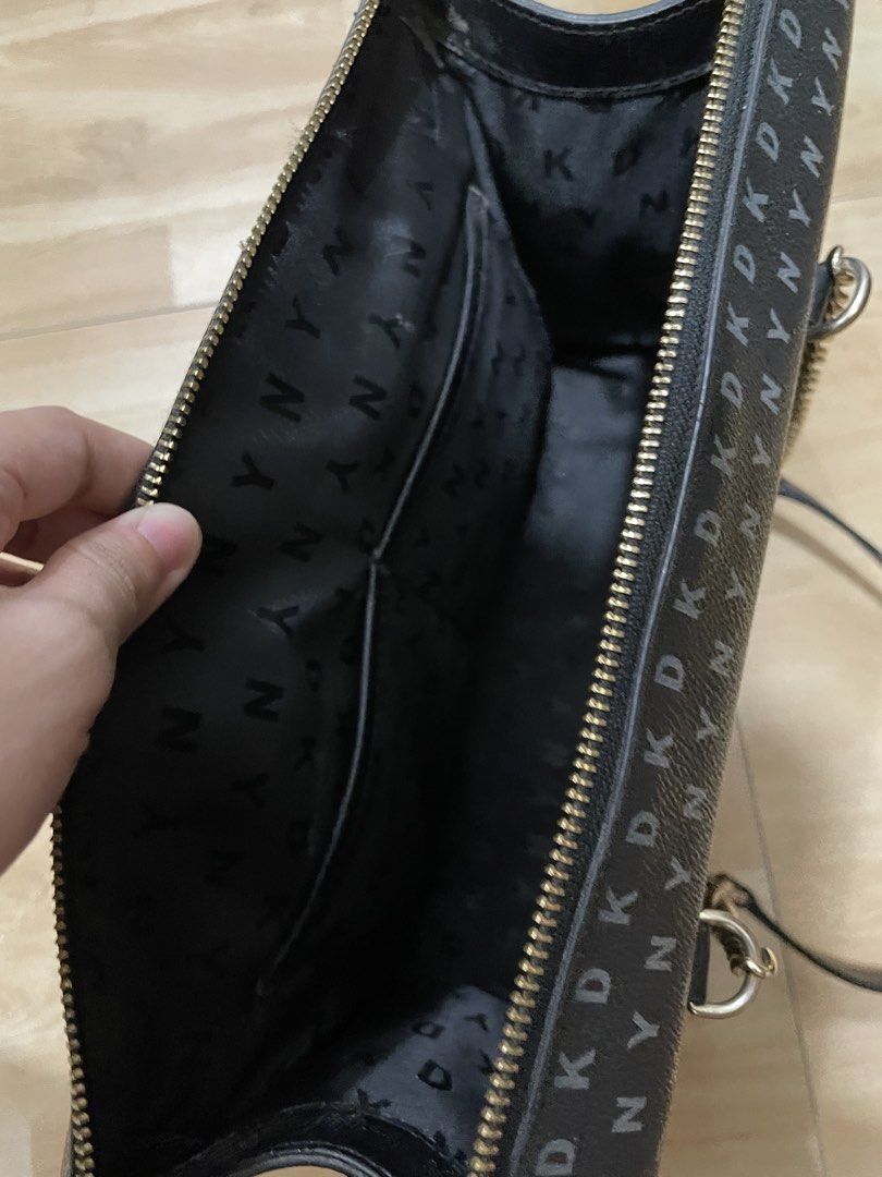 DKNY Shoulder Bag (Category: Shoulder Bags) located in Davao. Submitted by newowl_777 (Listing ID 1465892020, Image 3). Description: DKNY bag -Used only thrice -Well-stored -Original price is at $238 (₱14.8k) -Declutter .