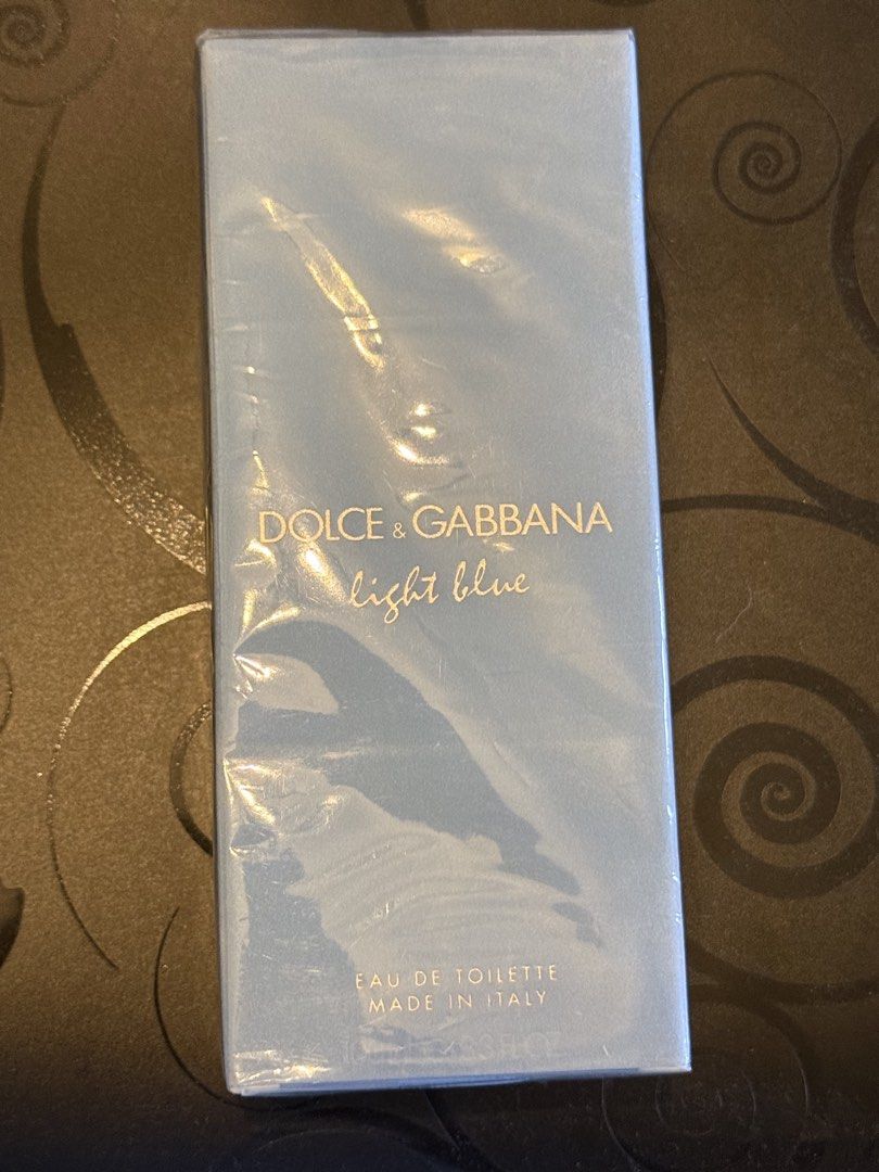 Dolce & Gabbana Light Blue Eau De Toilette (Category: Fragrance & Deodorants) located in Manila. Submitted by vinceyao88 (Listing ID 1465919947, Image 2). Description: - Brand: Dolce & Gabbana Light Blue (money back guarantee) - Formulation: Eau de Toilette (EDT) - Condition: Brand new, unopened, and sealed in original plastic - Origin: Made in Italy - Scent Profile: Classic fresh citrus and floral - Perfect for: Daily signature scent or gifting 