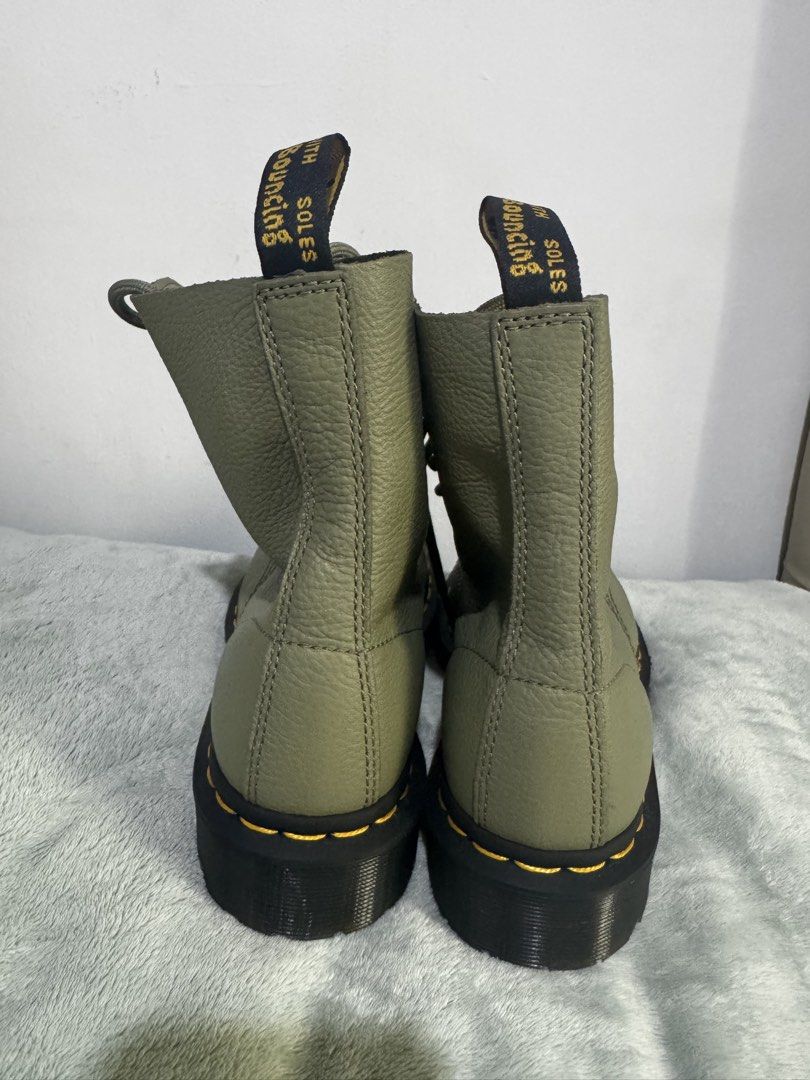 Dr. Martens 1460 Pascal Olive Green Leather Boots (Category: Boots) located in Valenzuela. Submitted by janettesevilla (Listing ID 1465790174, Image 3). Description: - Brand/Model: Dr. Martens 1460 Pascal - Color: Olive Green (Tumbled Leather) - Size: UK 6 / EU 39 / US L 8 - Features: 8-eye lace-up design, yellow welt stitching, signature air-cushioned soles - Origin: Made in Vietnam - Condition: Clean inside and out, minimal wear on soles.