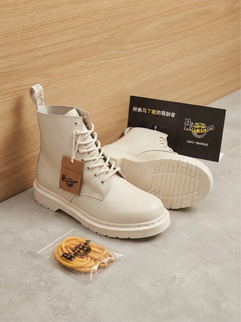 Dr. Martens White High Top Boots (Category: Boots) located in Makati City. Submitted by iconikarl (Listing ID 1465807650, Image 2). Description: Size US 9 men’s, US 10 women’s on tag Can fit US 8 men’s Authenticity not guaranteed that’s why selling low. With extra shoelace and eco bag but no box..