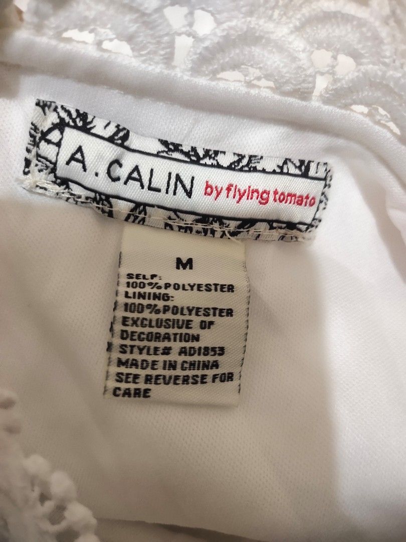 Dresses (Category: Dresses) located in Quezon City. Submitted by abby2917 (Listing ID 1465799654, Image 3). Description: Brand: A Flying Tomato Size: Medium - Large May light red stain sa likod pero hndi halata..