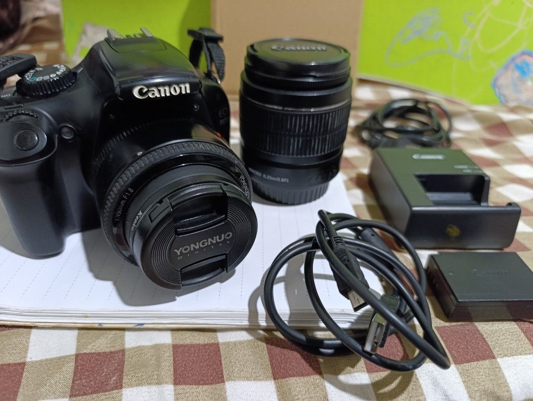 DSLR CANON EOS 1100D WITH PRIME LENS (Category: Cameras) located in Cuyapo. Submitted by hanehhhyoh (Listing ID 1465904410, Image 2). Description: FOR SALE OR SWAP SA IPAD Canon EOS 1100D with Prime Lens Specifications: • Sensor: 12.2MP APS-C CMOS • Processor: DIGIC 4 • ISO Range: 100–6,400 • Autofocus: 9-point AF • Continuous Shooting: Up to 3 fps • Video: Full HD 1080p • LCD: 2.7” LCD • Mount: Canon EF/EF-S • Storage: SD / SDHC / SDXC Inclusion