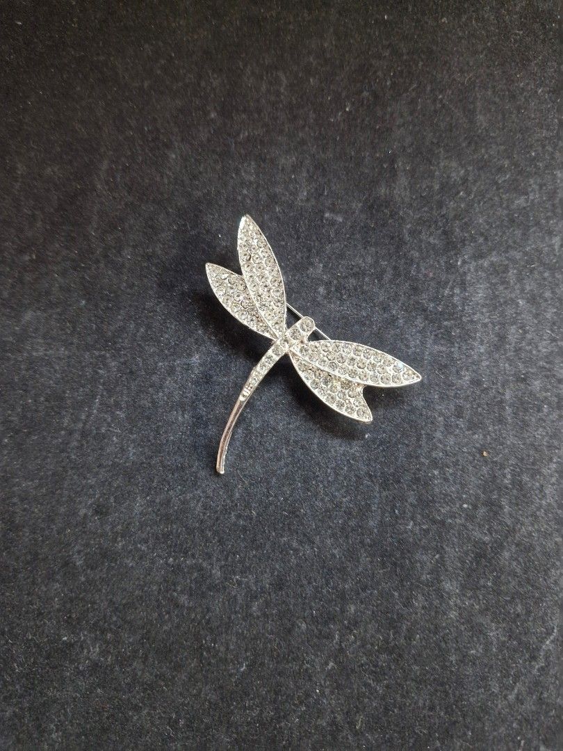Eastern Pondhawk Brooch (Category: Brooches) located in Taguig. Submitted by mommaschoice (Listing ID 1465773449, Image 1). Description: Brand new Beautifully crafted design Adorned W/ white rhinestones Silver-tone finish Lightweight won't damage the fabric Ships nationwide.