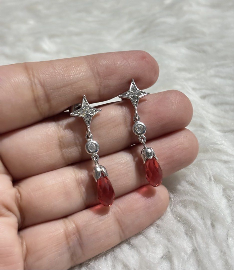 Elegant silver-toned drop earrings (Category: Earrings) located in Paranaque City. Submitted by dalle_closet (Listing ID 1465932230, Image 1). Description: .