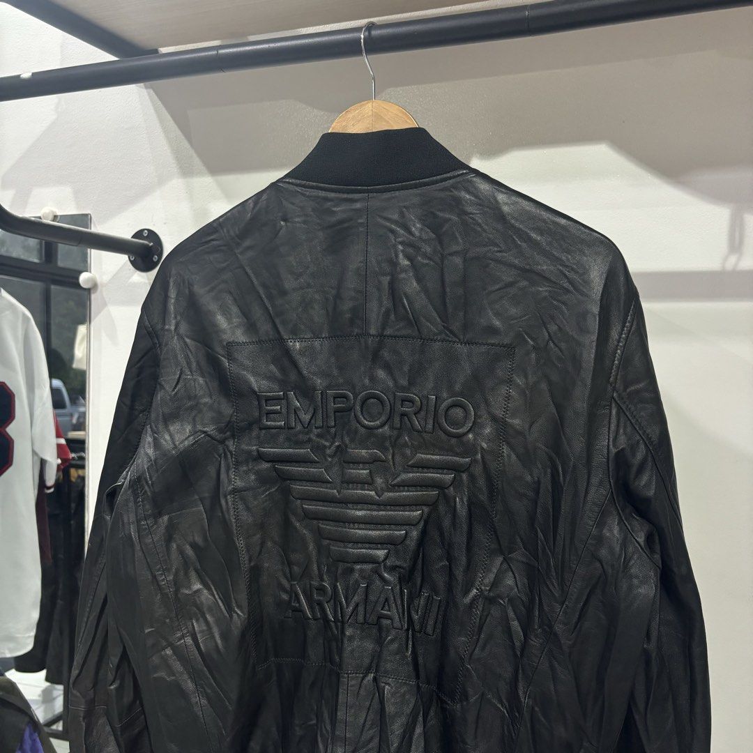 Emporio Armani Leather Bomber Jacket Embosed Design (Category: Coats, Jackets and Outerwear) located in Bambang. Submitted by heats777 (Listing ID 1465829434, Image 1). Description: Excellent condition No issue Size: 01 on tag.